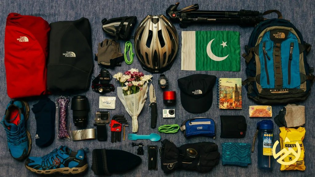 Camping and Climbing Gear Arranged on the Floor